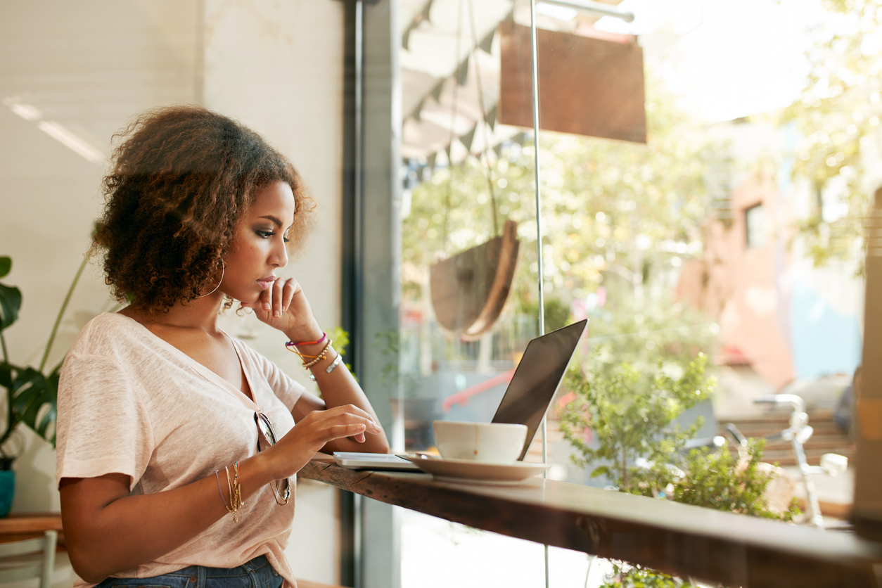 Small Business Owner reading our blog about trends affecting SMBs in 2023.